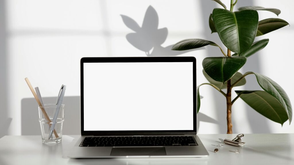 modern digital marketing workspace with laptop and clean desk setup